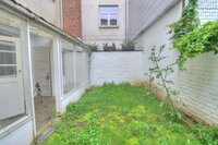 Quartier La Chasse: Appartement RDC avec jardin et cour