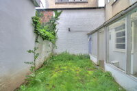 Quartier La Chasse: Appartement RDC avec jardin et cour